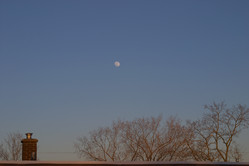 Moon over rooftop